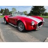 cobra réplique de la marque Classic Roadsters ,V8 6,7 litre , finition rouge a bandes blanche