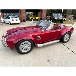 cobra 427 , BigBlock V8 7 litres Ford , constructeur Everett-Morrison  couleur rouge cerise metal vernis